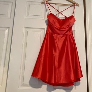 Party/homecoming/prom dress. Color reddish orange. Size 9/10 juniors. Laced back
